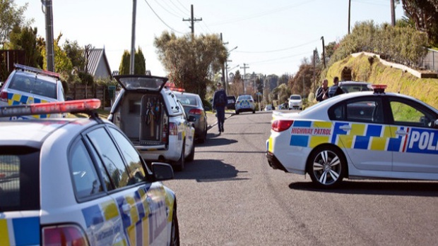 Police respond to reports of a stabbing on Mansels Road. Photo/Andrew Warner.