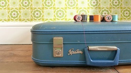 Woman turns vintage suitcases into one-of-a-kind decor