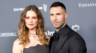 Adam Levine with his wife, Behati Prinsloo, who is expecting the couple's third child. Photo / Getty Images