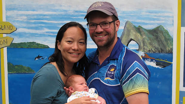 Grateful parents Naomi Facey and Neil Bolton with baby Emilia, who turns three weeks old tomorrow. Photo / Peter de Graaf