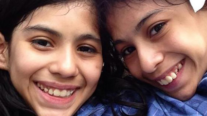 Lupita and Carmen Andrade, 16, were born joined from chest wall to pelvis. Photo / Twitter