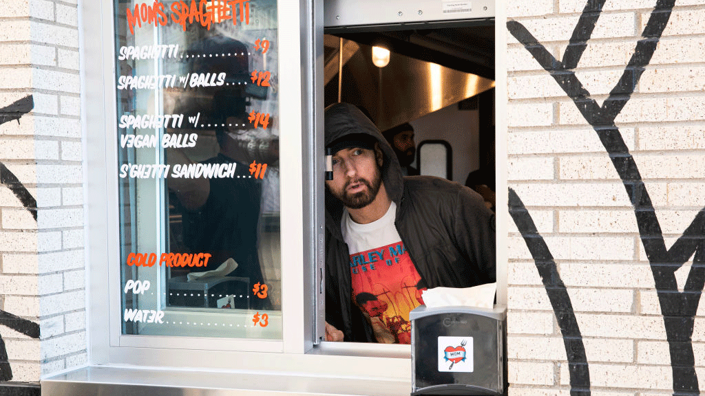 Eminem surprises fans at the opening of his Mom's Spaghetti restaurant inspired by song