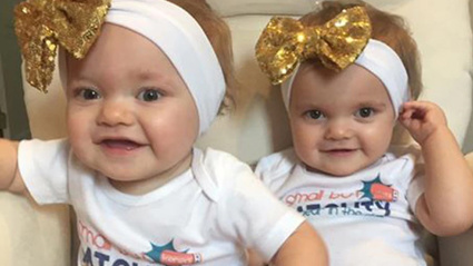 Kendal is an identical twin and both she and her sister Kenedi (pictured together) were diagnosed with cancer after their mother Abby Breyfolgle noticed sores on their bodies. Photo / Facebook