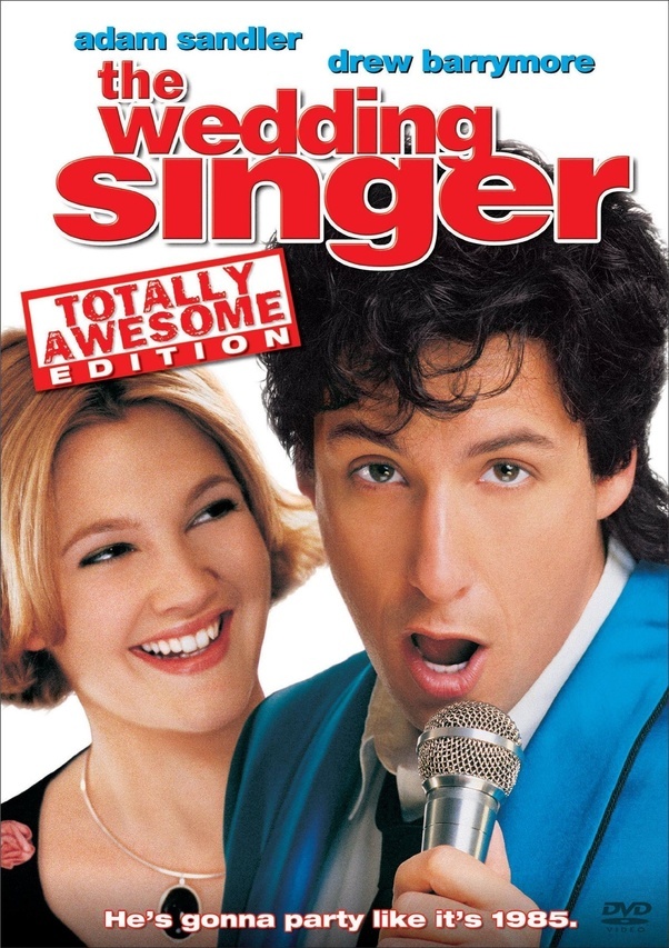 Set in 1985, The Wedding Singer sees Adam Sandler play a nice guy with a broken heart who's stuck working in one of the most romantic industries in the world. That is until he meets a young woman named Julia (Drew Barrymore), who enlists his help to plan her wedding.