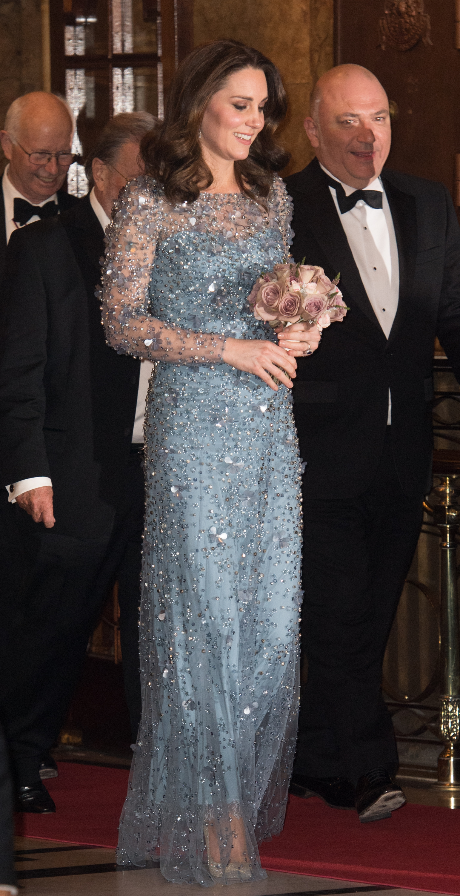 2. After announcing her third pregnancy, the Duchess of Cambridge wore an icy blue Jenny Packham gown that looked straight out of 'Frozen' to the Royal Variety Performance on November 24, 2017. Kate paired the stunning, long-sleeved gown with silver heels, her Casa clutch and the Queen's chandelier earrings.