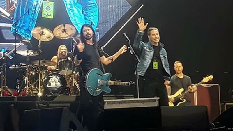 WATCH: John Travolta joins the Foo Fighters on stage for epic ‘Grease’ rendition