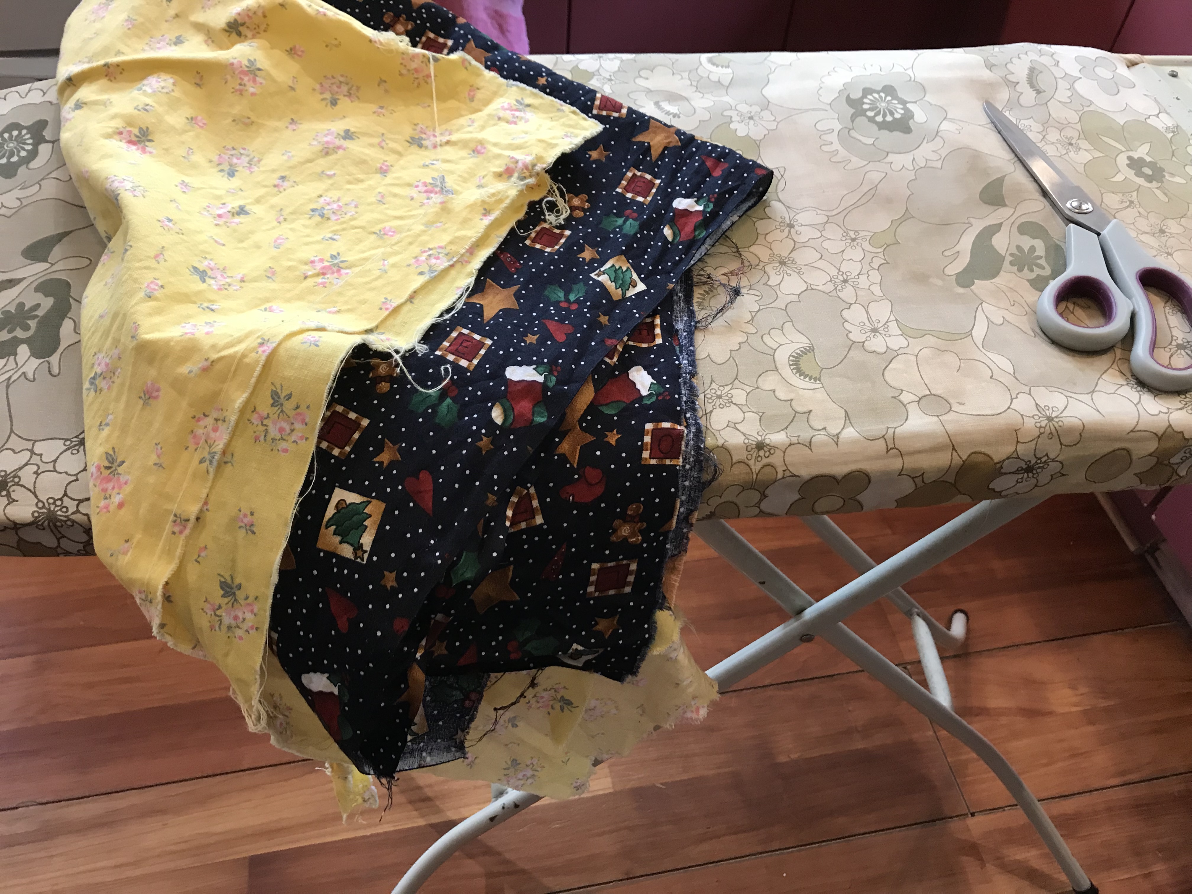 Washed and dried fabric yesterday, ironing and cutting it into wrap shapes