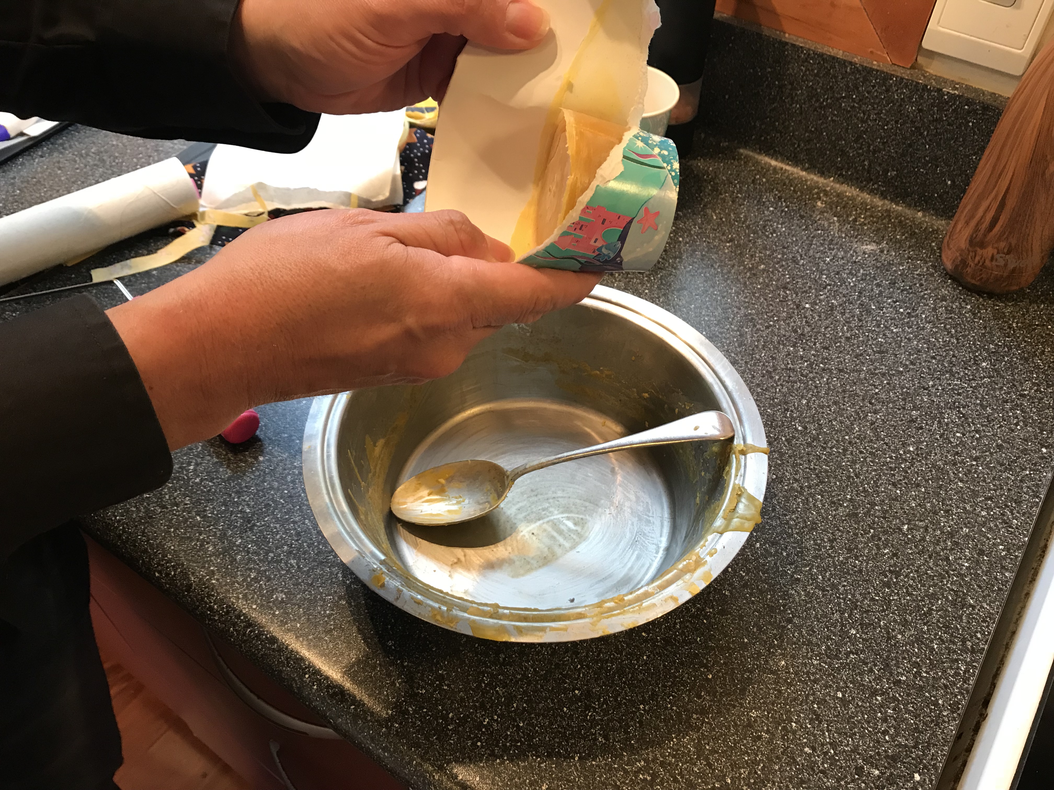 Gibby opening up the stored wax for me from that Try it out Tues when I rendered honeycomb