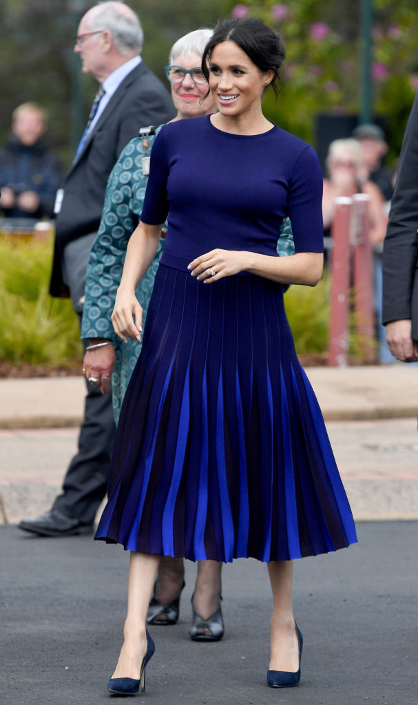 Meghan Markle wearing a navy blue Givenchy sweater-skirt combo in October 2018. Photo / Getty