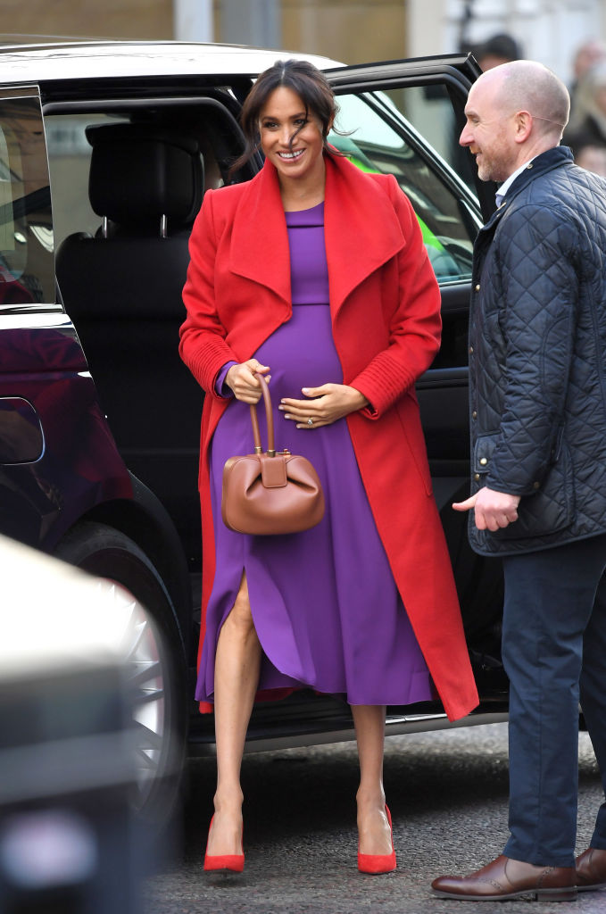 Meghan Markle wearing a red Sentaler coat and matching heels in January 2019. Photo / Getty