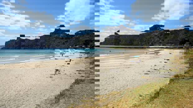 Taupō Bay is a popular surfing and family holiday destination, just north of the entrance to Whangaroa Harbour in Northland.