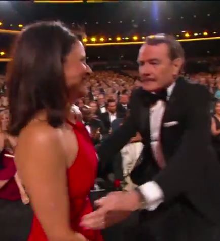 Julia Louis-Dreyfus gets a pash from Bryan Cranston!