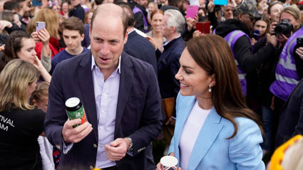 Prince William holds a can of "Return of the King" Coronation Ale as he stands next to Catherine, Princess of Wales at a street party in Windsor. Photo / Getty Images
