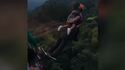 Man sparks outrage after doing a 60m bungy jump while HOLDING young daughter