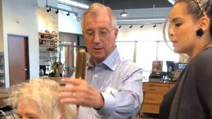 The heart breaking reason this husband has learned how to style his wife's hair