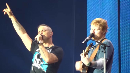 Robbie Williams joins Ed Sheeran on stage for surprise duet of 'Angels' - and it is AMAZING!