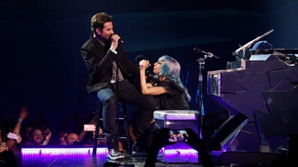 Lady Gaga surprises audience by bringing Bradley Cooper on stage to sing 'Shallow' live in Vegas!