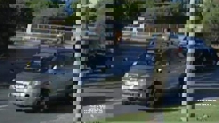 Shocking footage shows Perth mum driving with son strapped to roof rack