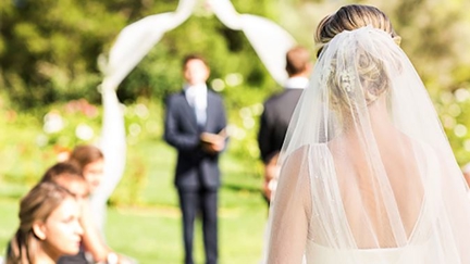 Wedding guest slammed for attempting to upstage the bride with "inappropriate" dress