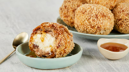 This Deep Fried Hot Cross Bun Balls recipe will become your new Easter favourite